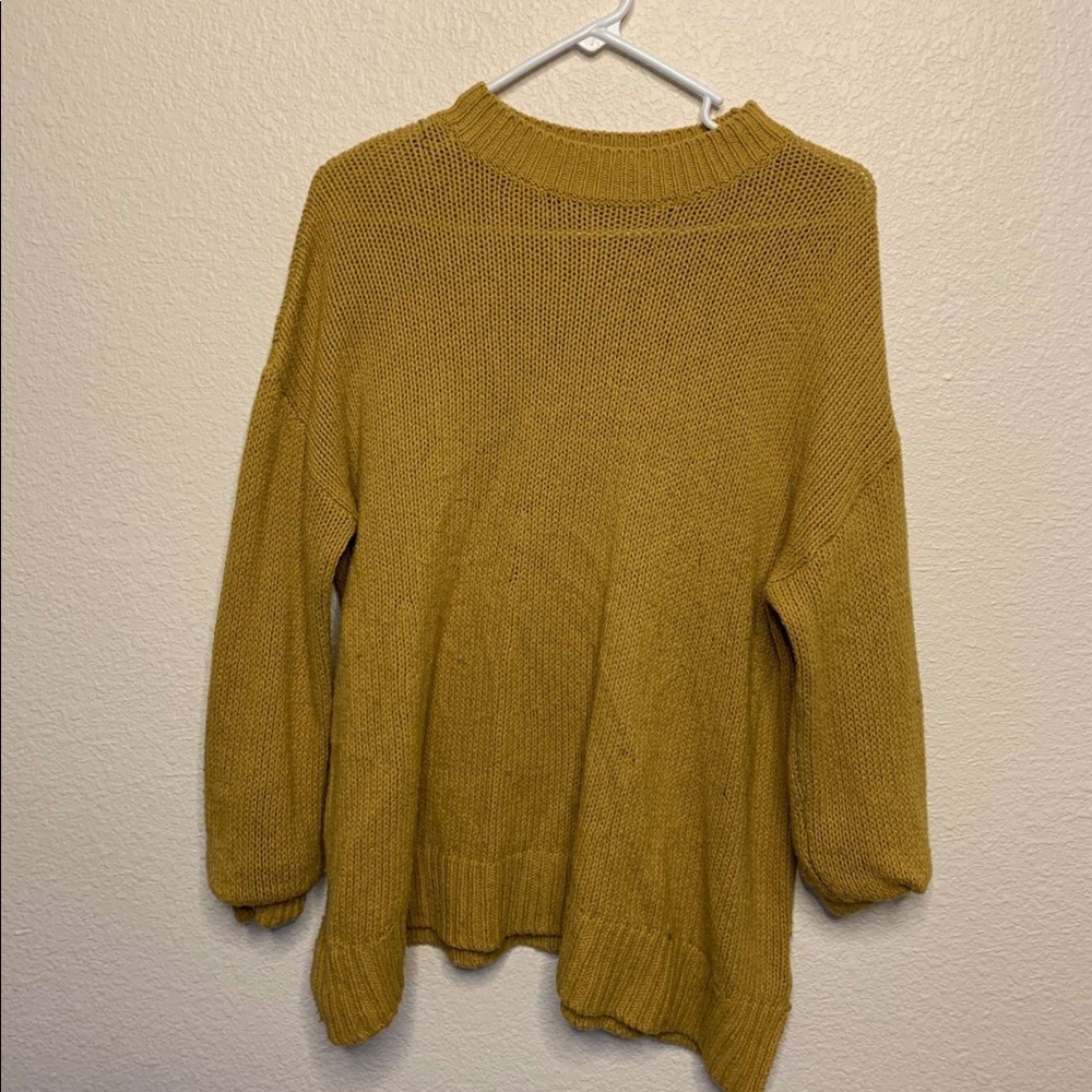 Yellow knitted long sleeve sweater
